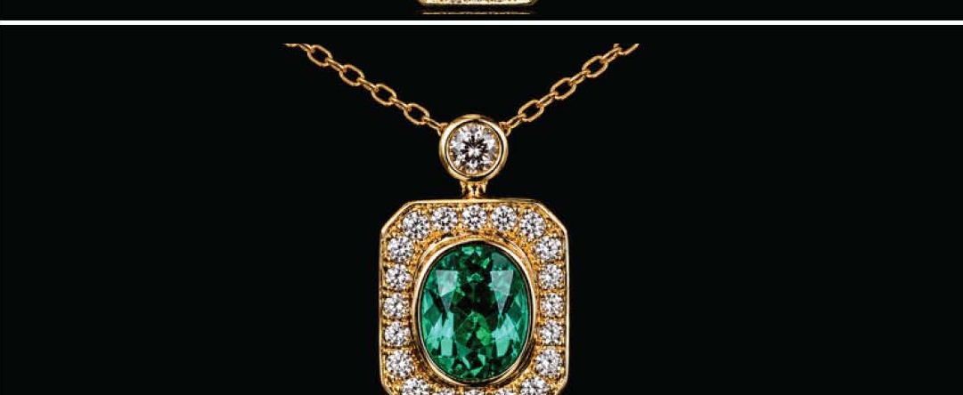 Oval Emerald Halo Diamond Pendant Necklace with Round Diamond Accent in Yellow Gold